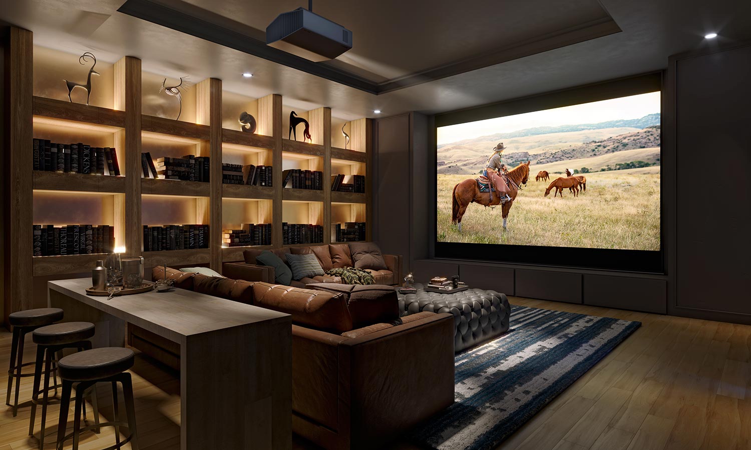 A warm, library-style home theater with built-in bookshelves, soft brown leather seating, and a projector screen displaying a scenic Western film.