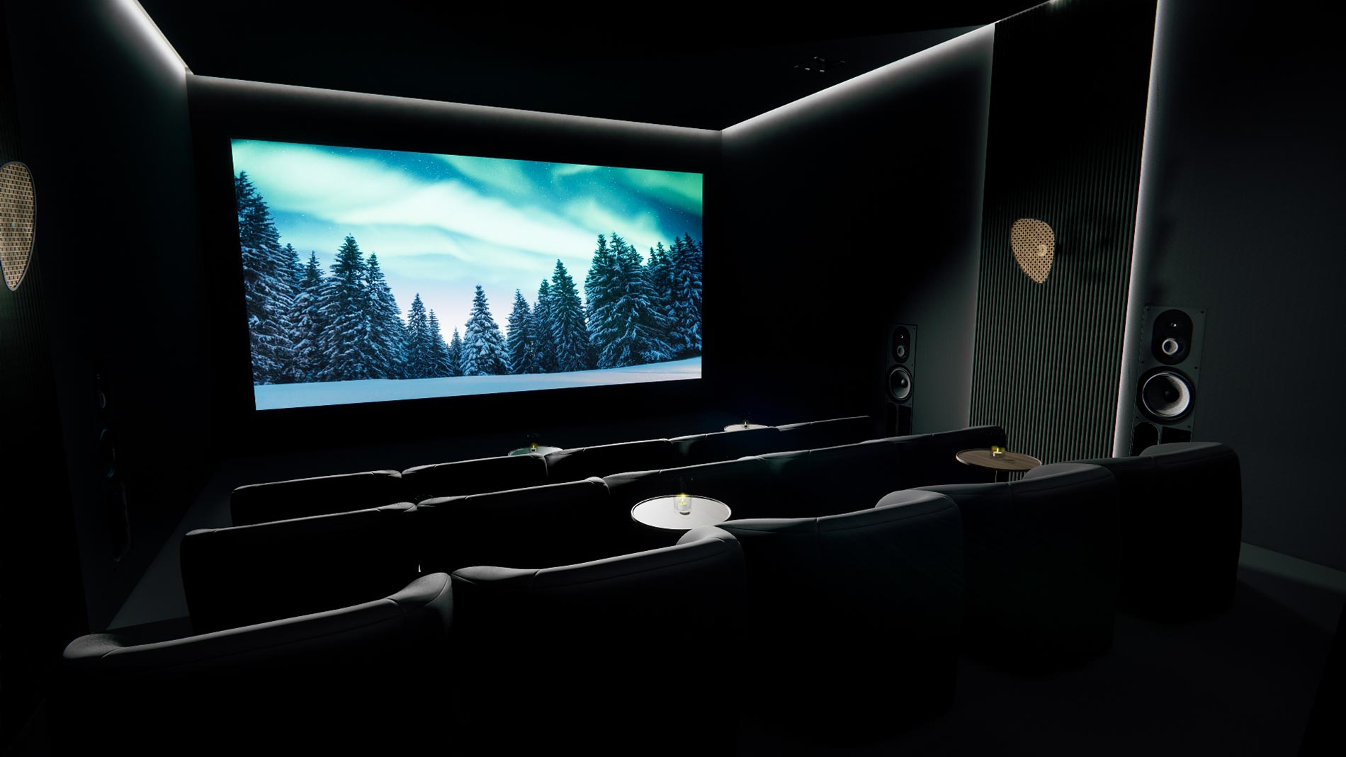 Dark home theater with forest scene on screen and side speakers